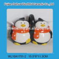 Promotional ceramic spice jar with penguin figurine